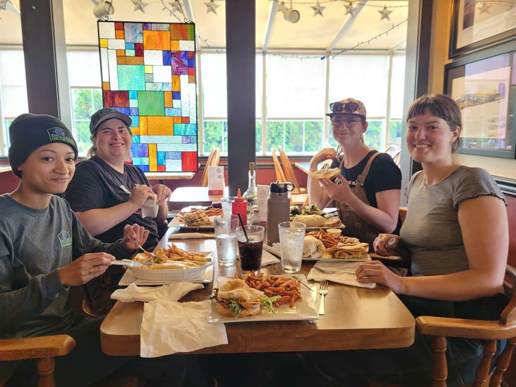 Group enjoying a meal together.